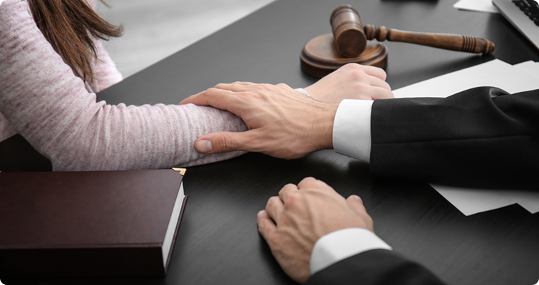 Lawyer comforting client